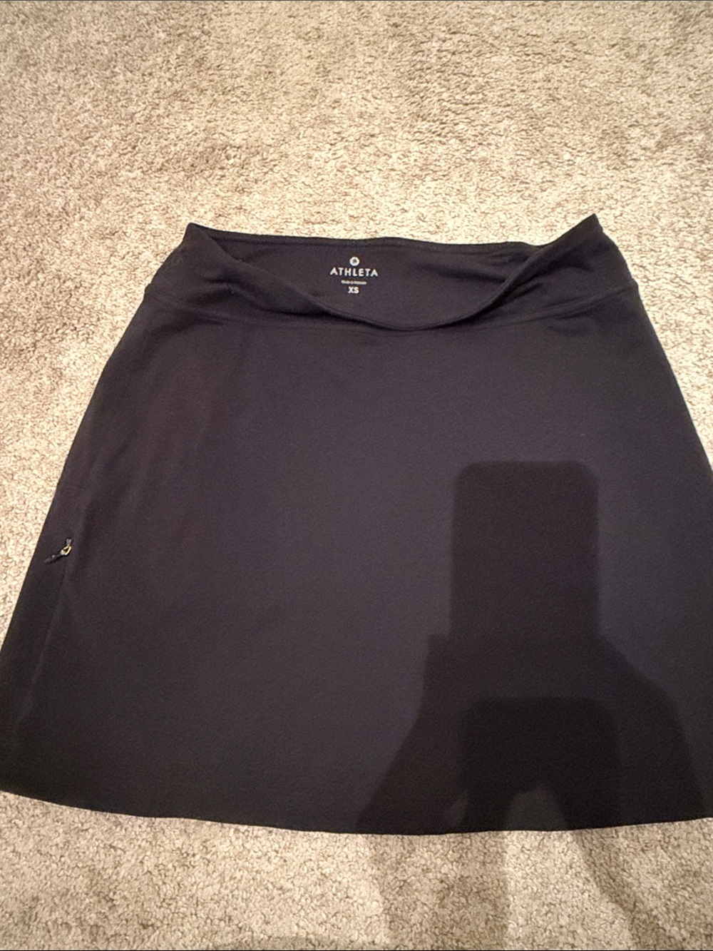 Athleta Black Mini Skirt with Subtle Zip Pocket